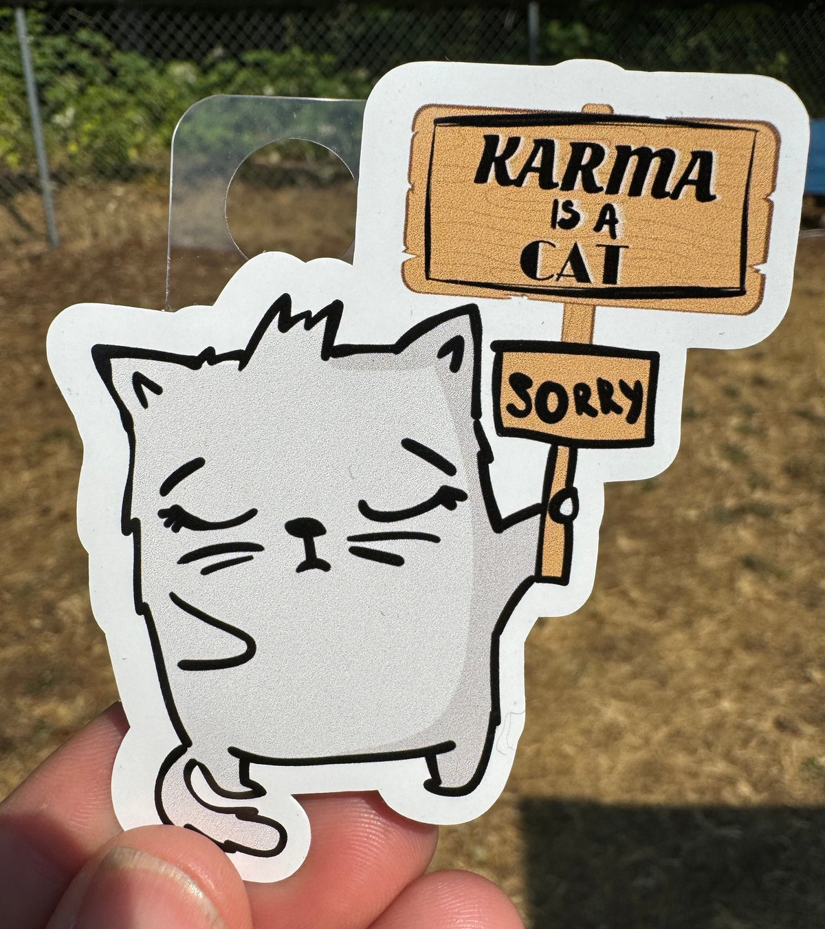 Karma Is Cat Sticker